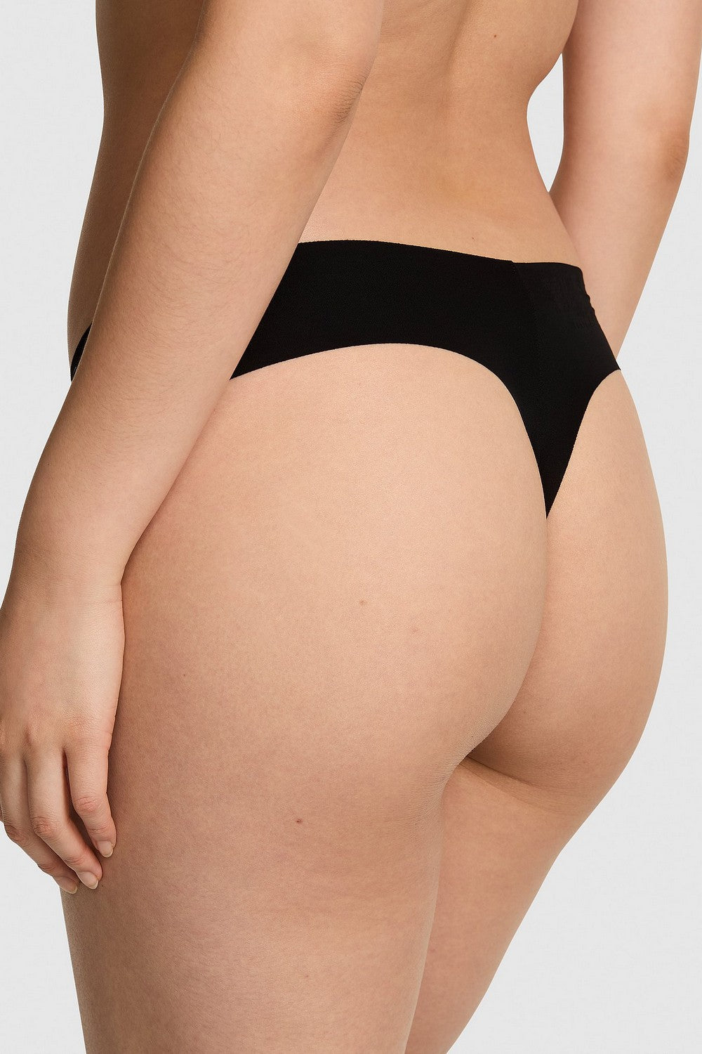 Безшовні трусики стрінг 590013173 black Victoria`s Secret спина