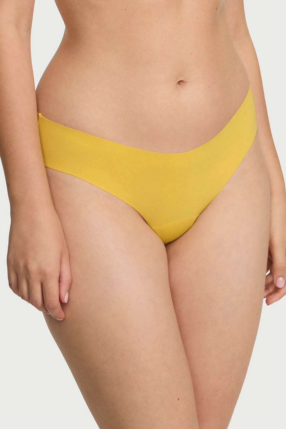 Безшовні трусики стрінг 748378825 yellow Victoria`s Secret