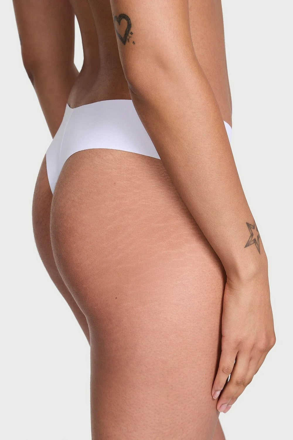 Безшовні трусики стрінг 816780390 white Victoria`s Secret спина