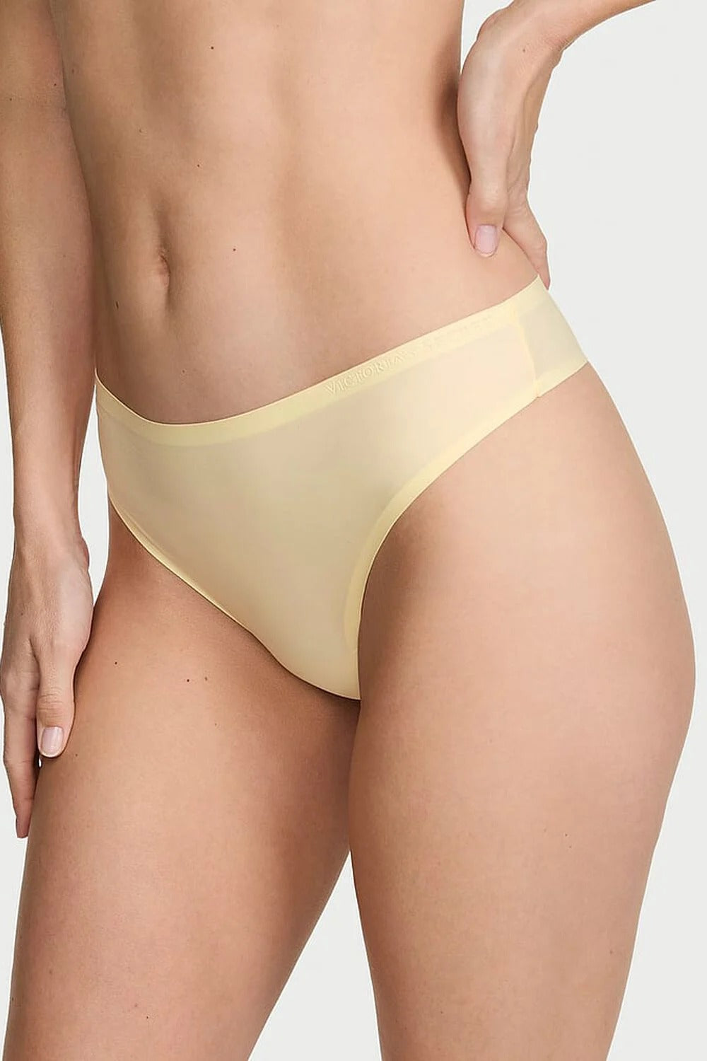 Безшовні трусики стрінг 540064549 yellow Victoria`s Secret