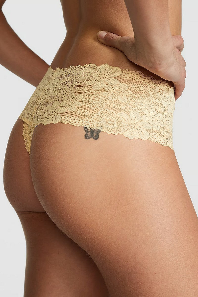 Кружевные трусики стринг 886540908 yellow
